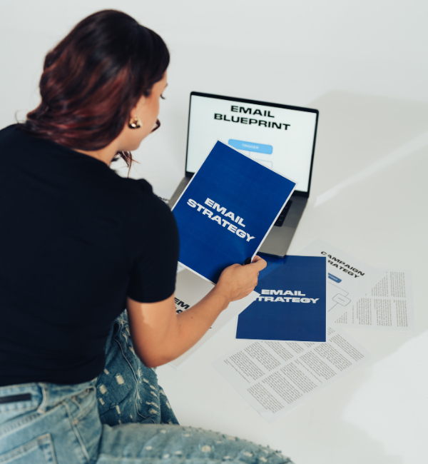 Sky Bailey holding your brand strategy and blueprint